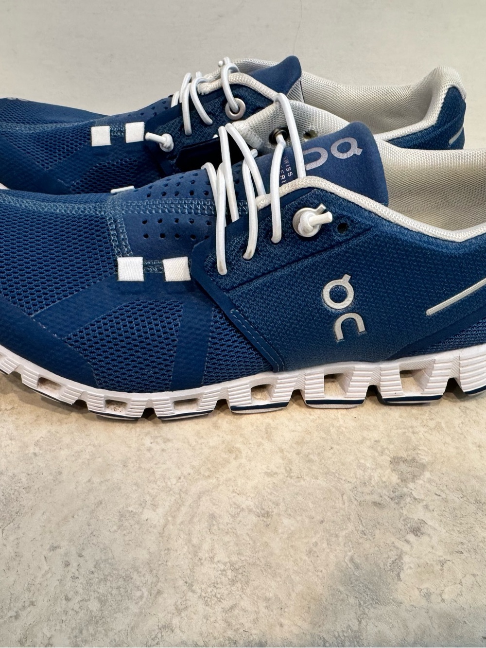 On Running women’s Cloud Sneakers in Navy and White